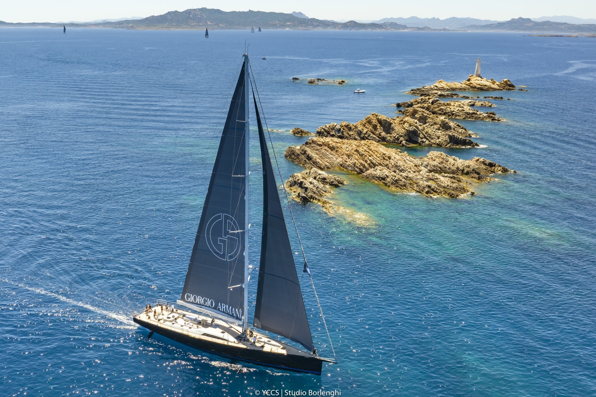 Sorvind by Giorgio Armani with the island of Monaci in the background