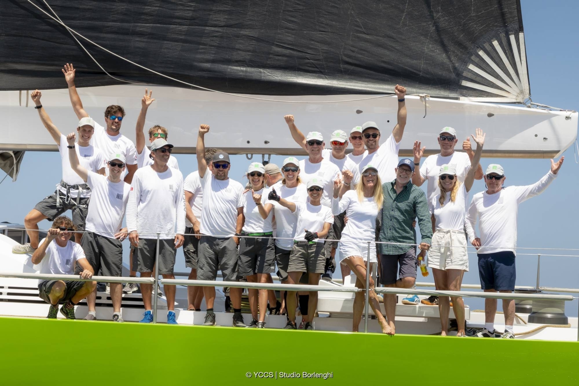 The Inoui crew celebrate their victory, Giorgio Armani Superyacht Regatta 2023